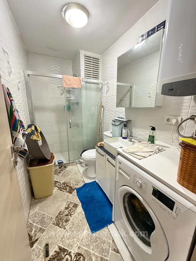 2+1 Wohnung Zum Verkauf Im Mittleren Stockwerk Im Zentrum Von Ürkmez, Seferihisar