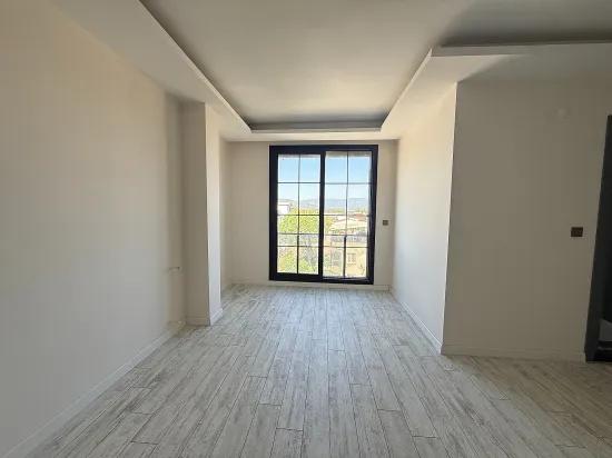 In Seferihisar Doğanbey Zu Verkaufen 1+1 Zur Meerseite Zu Verkaufende Wohnung