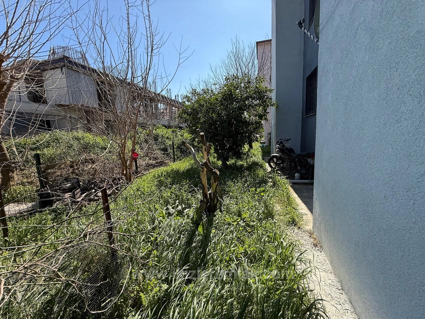 Ground Floor 2+1 Apartment With Garden For Sale In Seferihisar Ürkmez Center.