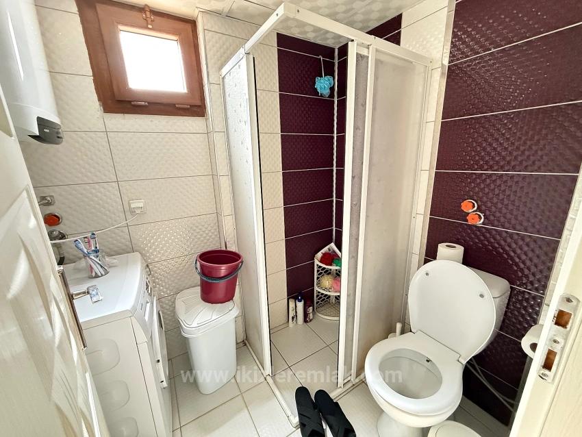 Ground Floor 2+1 Apartment With Garden For Sale In Seferihisar Ürkmez Center.