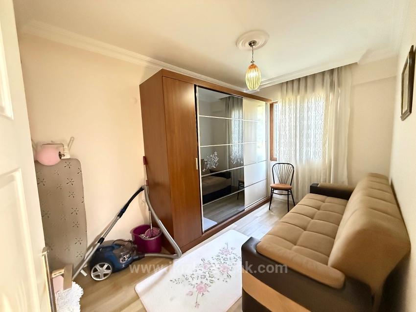 Ground Floor 2+1 Apartment With Garden For Sale In Seferihisar Ürkmez Center.