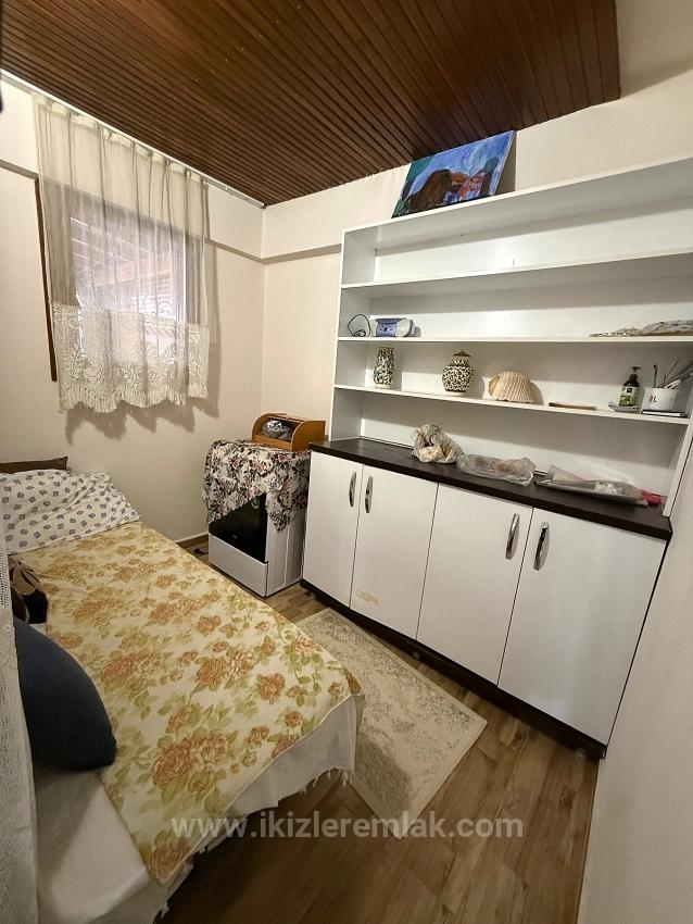 Ground Floor 2+1 Apartment With Garden For Sale In Seferihisar Ürkmez Center.