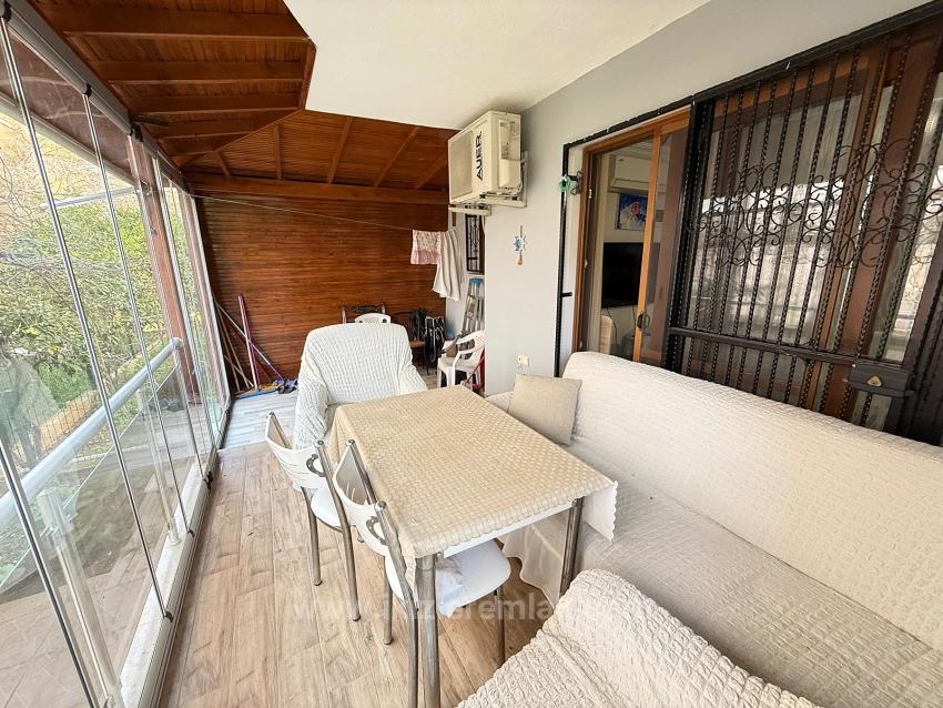 Ground Floor 2+1 Apartment With Garden For Sale In Seferihisar Ürkmez Center.