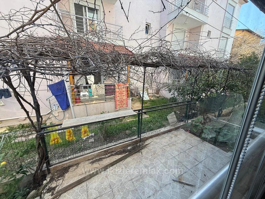 Квартира 2+1 На Первом Этаже С Садом На Продажу В Центре Сеферихисар Юрмез.