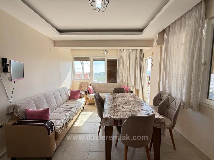 Gümüldür Merkezde Satılık 3 + 1 Deniz Ve Doğa Manzarali Yeni Daire